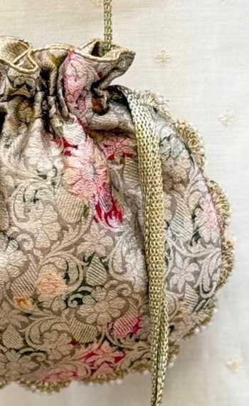 Shop AMYRA Pink Beads, Pearls, Crystals, Elora Brocade Pure Banarasi Silk Drawstring Potli Online at Aza Fashions Shop_AMYRA_Pink Beads, Pearls, Crystals, Elora Brocade Pure Banarasi Silk Drawstring Potli _Online_at_Aza_Fashions