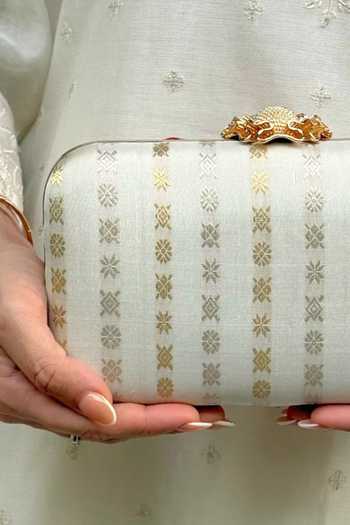AMYRA_Off White Zari Palki Pure Kanchi Silk Clutch _at_Aza_Fashions