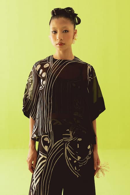 Esha Arora Black Round Neck Sheer Abstract Printed Top And Palazzo Set at Aza Fashions Esha Arora_Black Round Neck Sheer Abstract Printed Top And Palazzo Set _at_Aza_Fashions