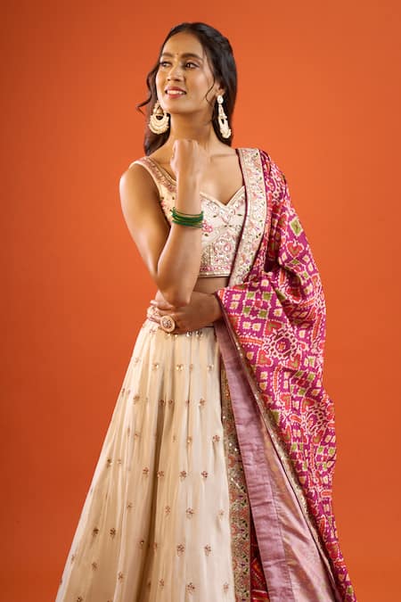 Buy_Samyukta Singhania_Cream Tissue Sequins, Zari, Stones, Embroidery, Tassels Paisley Lehenga Set _Online_at_Aza_Fashions