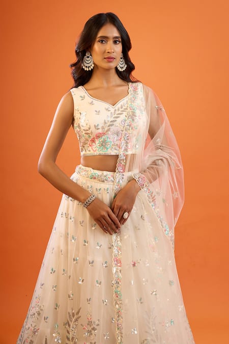 Shop Samyukta Singhania Cream Net Embroidery, Sequins V-neck Lehenga Set Online at Aza Fashions Shop_Samyukta Singhania_Cream Net Embroidery, Sequins V-neck Lehenga Set _Online_at_Aza_Fashions