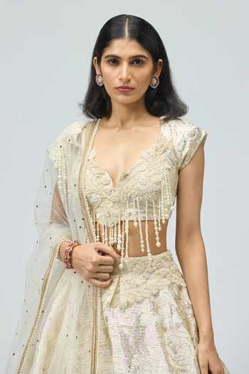 Buy Varun Bahl Ivory Silk, Brocade Embroidery, Pearls Sweetheart Dori Embellished Lehenga Set Online at Aza Fashions Buy_Varun Bahl_Ivory Silk, Brocade Embroidery, Pearls Sweetheart Dori Embellished Lehenga Set _Online_at_Aza_Fashions