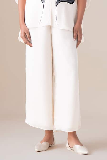 Shop Ampm Ivory Organza, Satin Open Neck, Scoop Veya Filigree Pattern Cape And Palazzo Set Online at Aza Fashions Shop_Ampm_Ivory Organza, Satin Open Neck, Scoop Veya Filigree Pattern Cape And Palazzo Set _Online_at_Aza_Fashions