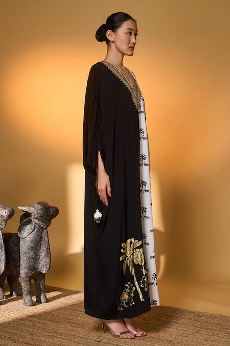 Masaba Black Silk, Crepe Tassels, Foil Printing V-neck And White Tropical Nandi Kaftan Online at Aza Fashions Masaba_Black Silk, Crepe Tassels, Foil Printing V-neck And White Tropical Nandi Kaftan _Online_at_Aza_Fashions