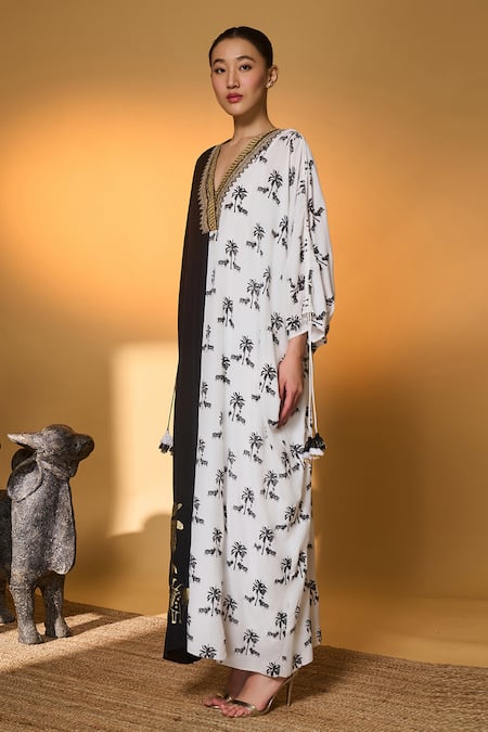 Shop Masaba Black Silk, Crepe Tassels, Foil Printing V-neck And White Tropical Nandi Kaftan Online at Aza Fashions Shop_Masaba_Black Silk, Crepe Tassels, Foil Printing V-neck And White Tropical Nandi Kaftan _Online_at_Aza_Fashions