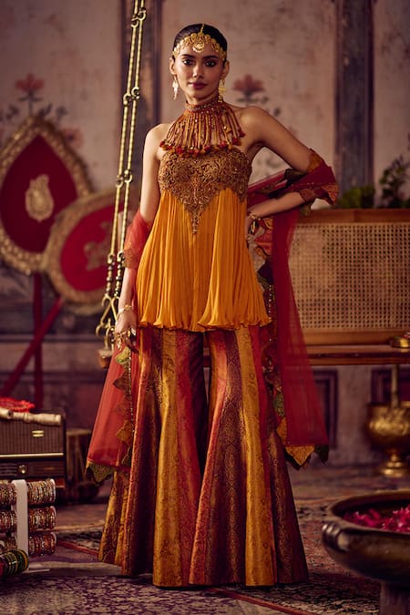 Reeti Arneja Kesariya Rang Peplum Kurta & Sharara Set
