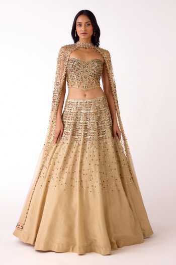 Basanti Kapde aur Koffee_Gold Silk, Net, Tissue Sequins, Beads, Stones And Work Lehenga Corset Blouse Set _at_Aza_Fashions