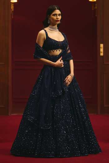 ANGAD SINGH_Blue Net Sequins, Tassels Scoop Neck Celestial Regency Embellished Lehenga Set _at_Aza_Fashions
