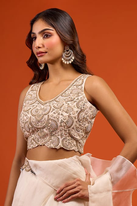Shop_Prisho_Ivory Ruffles, Embroidery, Zari, Tassels V-neck Pre-draped Saree Set _Online_at_Aza_Fashions