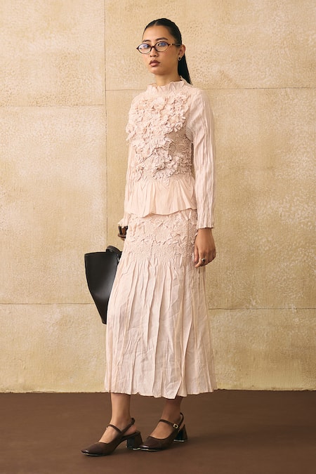 Shop_Pleats By Aruni_Ivory Crepe Ruffles, Fabric Flowers High Neck Jerome Textured Top _Online_at_Aza_Fashions