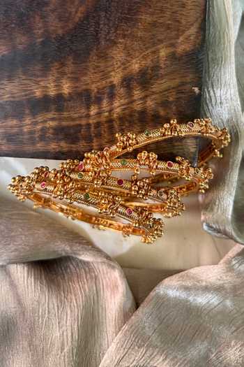 Prestones Gold Plated Beads, Stones Ghungroo Embellished Bangles - Set Of 4 Online at Aza Fashions Prestones_Gold Plated Beads, Stones Ghungroo Embellished Bangles - Set Of 4 _Online_at_Aza_Fashions