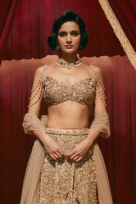 Roqa Rose Gold Net Embroidery, Sequins, Beads, Zari, Stones, Eliza Lehenga Set Online at Aza Fashions Roqa_Rose Gold Net Embroidery, Sequins, Beads, Zari, Stones, Eliza Lehenga Set _Online_at_Aza_Fashions