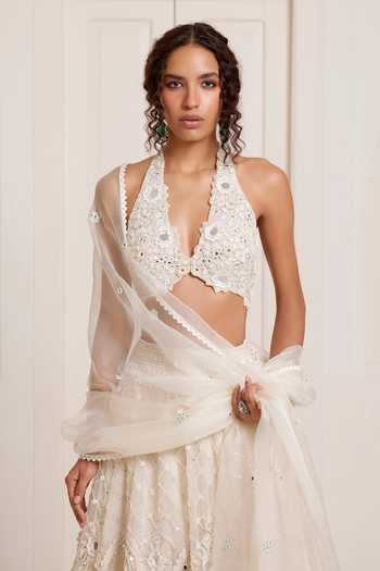 Buy_Surily G_Ivory Net Embroidery, Sequins, Mirrors Halter Neck Lehenga Set _Online_at_Aza_Fashions
