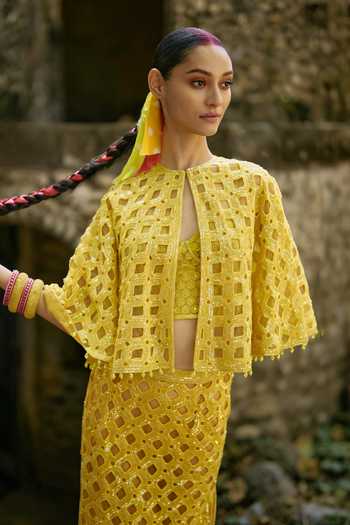 Surily G Yellow Organza Cut Work Embroidered Cape And Skirt Set at Aza Fashions Surily G_Yellow Organza Cut Work Embroidered Cape And Skirt Set _at_Aza_Fashions