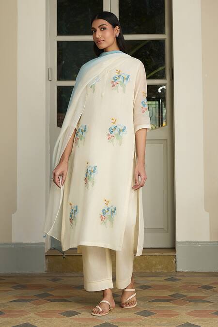Vaayu Blue Muslin Applique, Tassels Round Neck Ivory Floral Kurta Set Online at Aza Fashions Vaayu_Blue Muslin Applique, Tassels Round Neck Ivory Floral Kurta Set _Online_at_Aza_Fashions