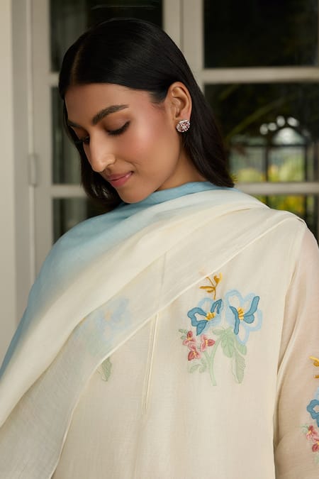 Buy Vaayu Blue Muslin Applique, Tassels Round Neck Ivory Floral Kurta Set Online at Aza Fashions Buy_Vaayu_Blue Muslin Applique, Tassels Round Neck Ivory Floral Kurta Set _Online_at_Aza_Fashions