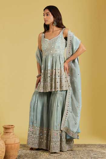 Meenagurnam_Blue Tissue Zari, Mirrors Sweetheart Flower Jaal Work Peplum Kurta Gharara Set _Online_at_Aza_Fashions