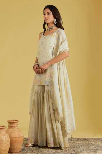 Meenagurnam_Beige Tissue Embroidery, Sequins, Beads V-neck Flower Jaal Kurta Gharara Set _Online_at_Aza_Fashions