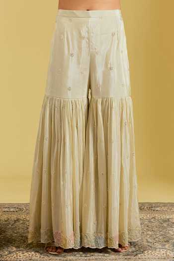 Shop_Meenagurnam_Beige Tissue Embroidery, Sequins, Beads V-neck Flower Jaal Kurta Gharara Set _Online_at_Aza_Fashions