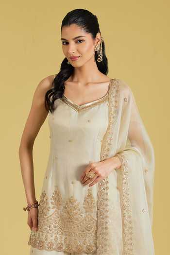 Meenagurnam_Beige Tissue Embroidery, Sequins, Beads V-neck Motif Kurta Gharara Set _Online_at_Aza_Fashions