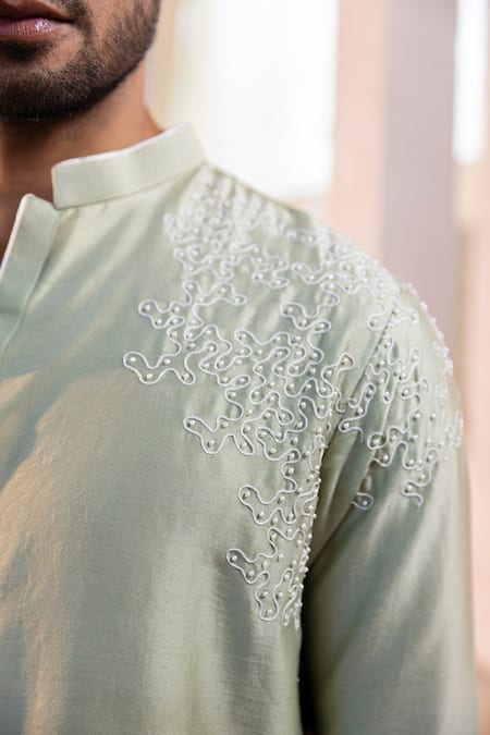 Kaaj Button Green Cotton, Chanderi Silk, Lycra Embroidery Worms Placement Kurta Set at Aza Fashions Kaaj Button_Green Cotton, Chanderi Silk, Lycra Embroidery Worms Placement Kurta Set _at_Aza_Fashions