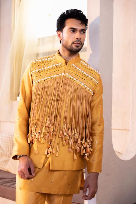 Kaaj Button Yellow Chanderi Silk Mirrors, Tassels Embroidered Bundi And Kurta Set at Aza Fashions Kaaj Button_Yellow Chanderi Silk Mirrors, Tassels Embroidered Bundi And Kurta Set _at_Aza_Fashions