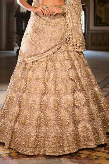 Seema Gujral_Gold Net Sequins, Beads, Pearls, Tassels Scoop Embroidered Bridal Lehenga Set _at_Aza_Fashions