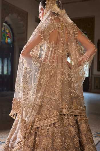 Shop_Seema Gujral_Gold Net Sequins, Beads, Pearls, Tassels Scoop Embroidered Bridal Lehenga Set 