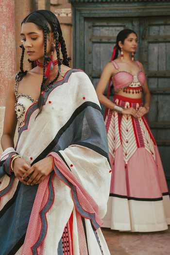 Buy_Shwetanga_Red Cotton Beads, Fabric Flowers Sweetheart Panelled Naga Skirt And Bustier Set _Online_at_Aza_Fashions