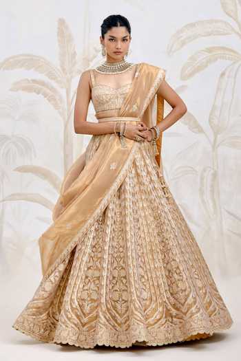 Shop_Shyam Narayan Prasad_Gold Silk, Organza, Tissue Gota Patti, Tassels Embroidered Lehenga Set _Online_at_Aza_Fashions