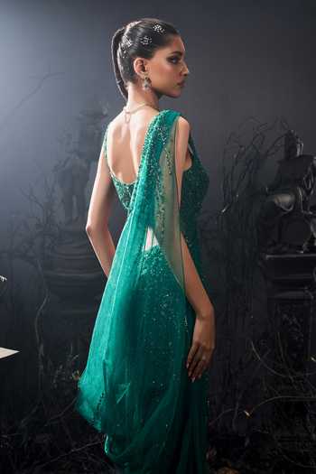 Shivani Awasty_Emerald Green Net Embroidery, Sequins Asymmetric Embellished Draped Saree Gown _Online_at_Aza_Fashions