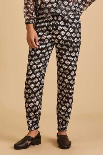 Siddartha Tytler_Black Satin Lotus Print Joggers _Online_at_Aza_Fashions