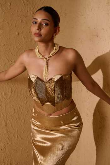 Vedangi Agarwal_Gold Brocade Embroidery Sweetheart Neck Top And Skirt Set _Online_at_Aza_Fashions