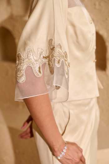 Vedangi Agarwal_Ivory Organza, Satin Cut Work V-neck Floral Sleeve Embroidered Top And Pant Set _Online_at_Aza_Fashions