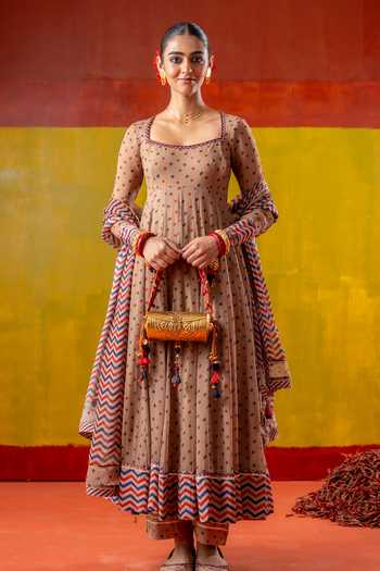 BAISE GABA Blue Mirrors, Tassels, Pom-poms Padmini Floral Carved Bag Online at Aza Fashions BAISE GABA_Blue Mirrors, Tassels, Pom-poms Padmini Floral Carved Bag _Online_at_Aza_Fashions