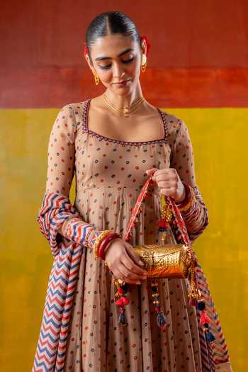 Buy BAISE GABA Blue Mirrors, Tassels, Pom-poms Padmini Floral Carved Bag Online at Aza Fashions Buy_BAISE GABA_Blue Mirrors, Tassels, Pom-poms Padmini Floral Carved Bag _Online_at_Aza_Fashions