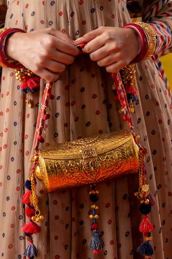 Buy BAISE GABA Blue Mirrors, Tassels, Pom-poms Padmini Floral Carved Bag Buy_BAISE GABA_Blue Mirrors, Tassels, Pom-poms Padmini Floral Carved Bag