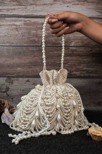 Buy_Nayaab By Sonia_Off White Pearls, Tassels Work Velvet Potli Bag 