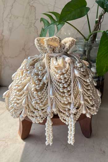 Shop_Nayaab By Sonia_Off White Pearls, Tassels Work Velvet Potli Bag 