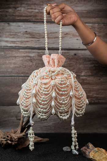 Shop_Nayaab By Sonia_Pink Pearls Work Velvet Potli Bag _Online_at_Aza_Fashions