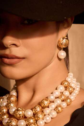 Buy_Mnsh_White Pearls Audrey Rosette Earrings _Online_at_Aza_Fashions