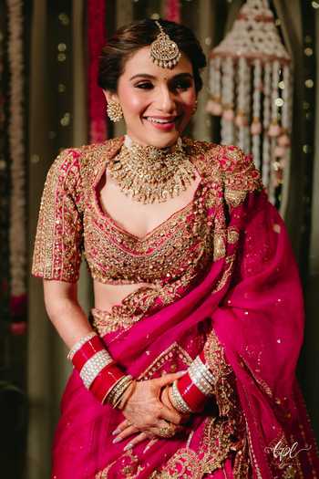 Itrh_Pink Silk, Georgette Zari, Stones, Regal Motif Embroidered Bridal Lehenga Set _Online_at_Aza_Fashions