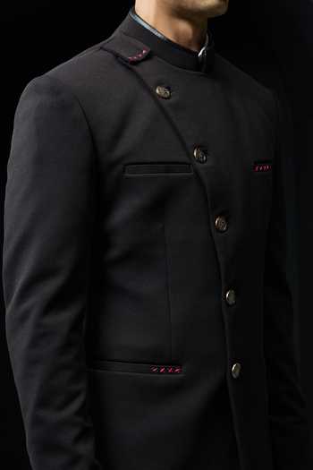 Shop_Sarab Khanijou_Black Suiting Asymmetric Buttoned Bandhgala And Trouser Set _Online_at_Aza_Fashions