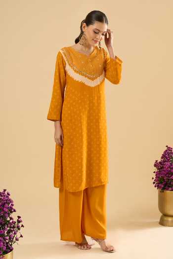 Shop Khwaab By Sanjana Lakhani Yellow Muslin Sequins, Stones V-neck, Yes Printed Kurta And Palazzo Set Online at Aza Fashions Shop_Khwaab By Sanjana Lakhani_Yellow Muslin Sequins, Stones V-neck, Yes Printed Kurta And Palazzo Set _Online_at_Aza_Fashions