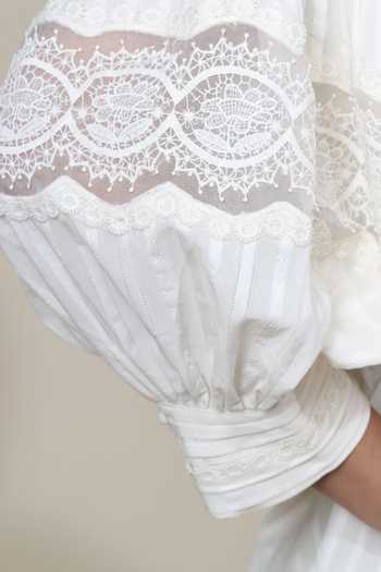Bunka Ivory Cotton Lace High Neck Lea Pintuck Pleated Top at Aza Fashions Bunka_Ivory Cotton Lace High Neck Lea Pintuck Pleated Top _at_Aza_Fashions