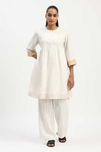 ABRAHAM AND THAKORE_Ivory Linen Round Neck Pleated Tunic _at_Aza_Fashions