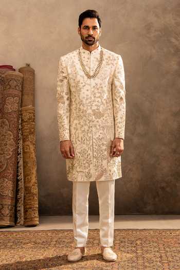 Buy_Millionaire_Cream Silk Embroidery, Zari Floral Raw Sherwani Set 