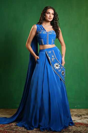 Ahi Clothing Blue Crepe Embroidery, Beads, Pearls, Tassels Sweetheart Corset And Lehenga Set at Aza Fashions Ahi Clothing_Blue Crepe Embroidery, Beads, Pearls, Tassels Sweetheart Corset And Lehenga Set _at_Aza_Fashions