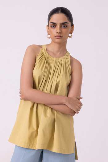The Summer House_Yellow Cotton Halter Neck Margo Pleated Top_at_Aza_Fashions