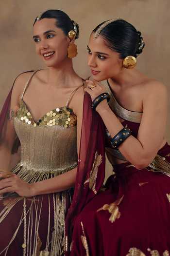 Ajiesh Oberoi_Maroon Georgette, Lurex, Noor-e-gulab Metallic Pattern Lehenga And Blouse Set _at_Aza_Fashions